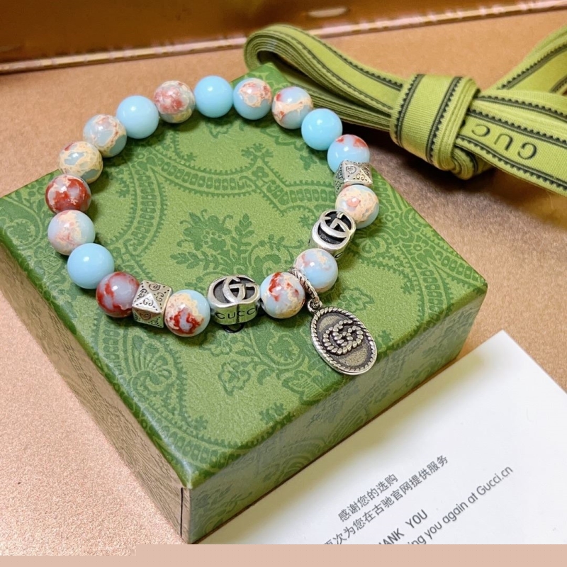 G*u*i bracelets